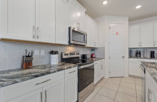 Four Corners Villa | Rear Views, Spa, Games Room, Pet Friendly, Resort Amenities 8 Bedroom Villa