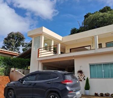 Bueno Brandao Casa | Recanto Feliz na Terra das Cachoeiras