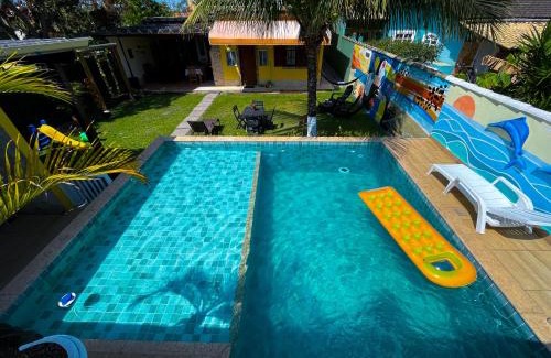 Unamar Casa | Recantos Pinheiros - Casa inteira, até 15 hóspedes - Piscina privativa, sinuca, ar condicionado e TVs nos 4 quartos - Condomínio Orla 500, lado praia - Unamar, Cabo Frio-RJ