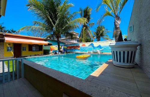 Unamar Casa | Recantos Pinheiros - Casa inteira, até 15 hóspedes - Piscina privativa, sinuca, ar condicionado e TVs nos 4 quartos - Condomínio Orla 500, lado praia - Unamar, Cabo Frio-RJ