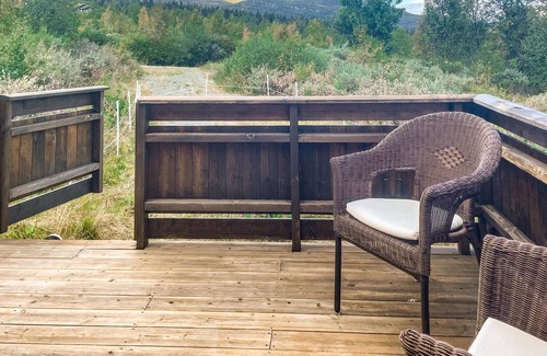 Nordre Land Casa | Recharge your batteries in this cozy log cabin near the Synna River.
