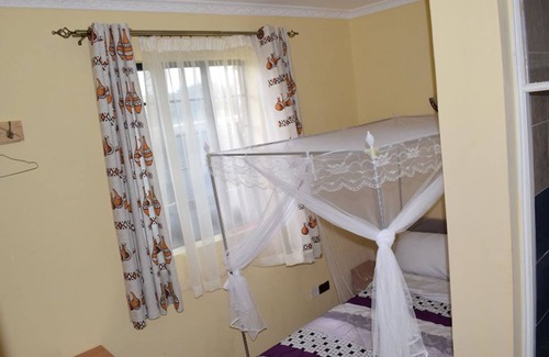 Ngelani Cama Y Desayuno | Reconfort Villa Guest House