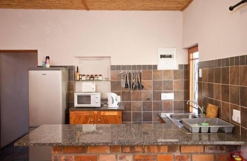 Oudtshoorn Cabaña | Red Stone Hills