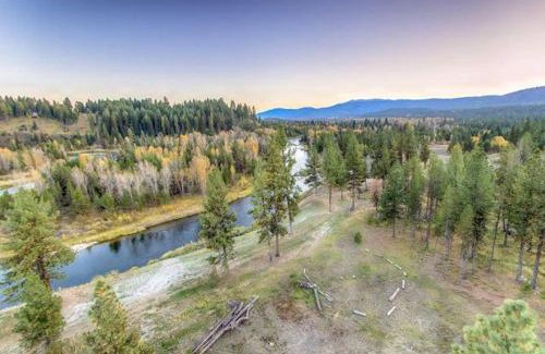 McCall Casa | Red Tail on the River by Casago McCall - Donerightmanagement
