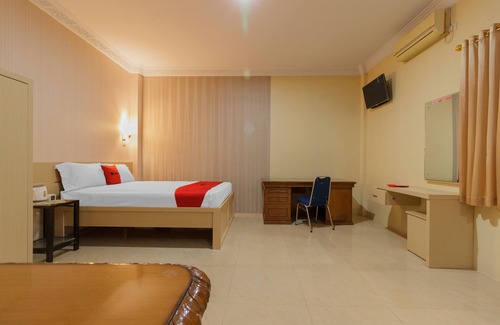 Manado Hotel | RedDoorz Plus near Pantai Malalayang Manado
