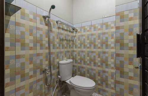 Manado Hotel | RedDoorz Plus near Pantai Malalayang Manado