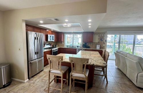 Laguna Shores Casa | Redfish Retreat - South End Pool Home