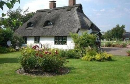 Helse Casa | Reetdachhaus Petra