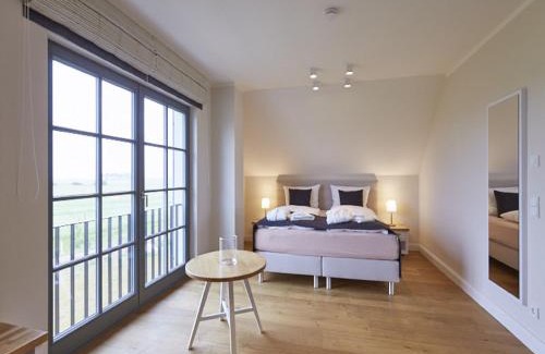 Kreptitz Casa | Reetland am Meer - Premium Reetdachvilla mit 2 Schlafzimmern, Sauna und Kamin E22