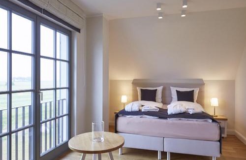 Kreptitz Casa | Reetland am Meer - Premium Reetdachvilla mit 2 Schlafzimmern, Sauna und Kamin E22