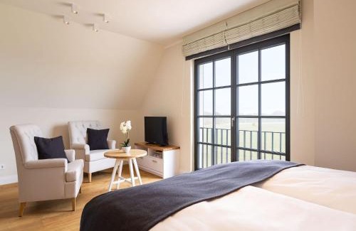 Kreptitz Casa | Reetland am Meer - Premium Reetdachvilla mit 2 Schlafzimmern, Sauna und Kamin E25