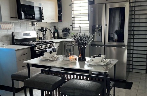 Portmore Casa | Refined luxury awaits you, where sophistication reigns with a Taste of Opulence!