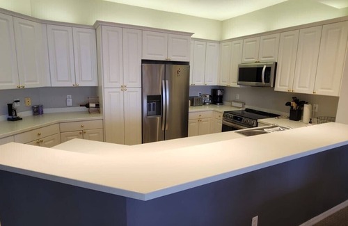 Pelican Bay Condominio | Regatta at Vanderbilt is an upscale condo - a 7 minute walk to the beach!