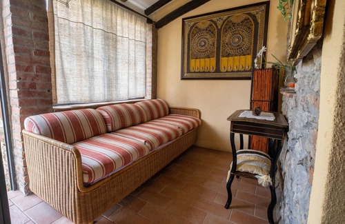 Castiglione della Pescaia Apartamento | Reggia, in small medieval village characteristic apartment with fireplace