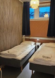 Reine Hostal | Reine Basecamp - Apartments & Rooms