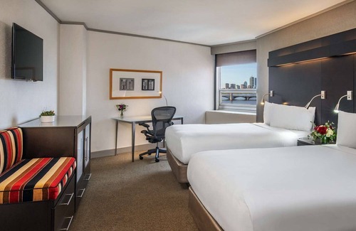 East Cambridge Hotel | Relax in a Cozy Room w/ Stunning Charles River & Boston Skyline Views