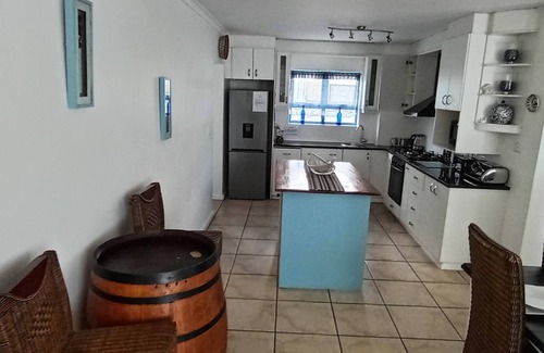 Calypso Beach Casa | Relájese con estilo en La Kruger Blue, la mejor casa de vacaciones de Langebaan