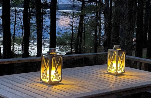 Oxford Cabaña | Relax in the glow of a campfire at this waterfront cottage on Thompson Lake