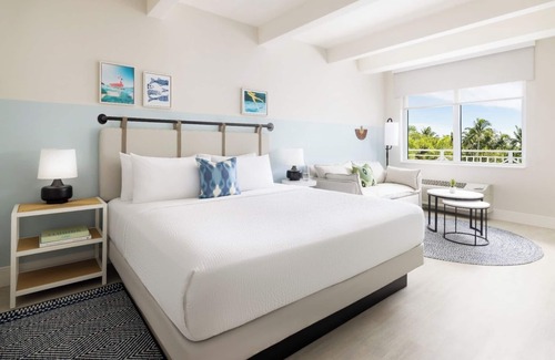 New Town Hotel | Relax & Play in Key West | Shuttle, Lawn Games & Poolside Dining