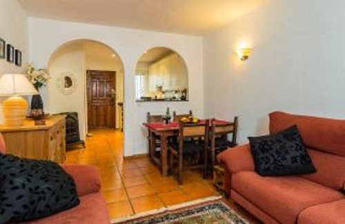 Oasis del Capistrano Apartamento | Relax .. terraza con vistas al mar, sol todo el día, vistas a jardines tropicales y piscinas