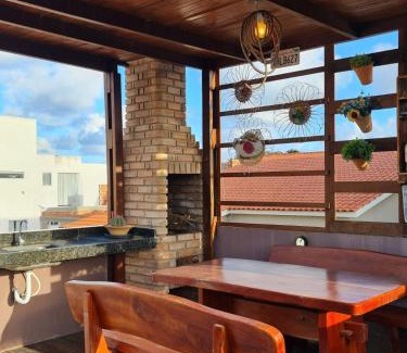 Atalaia Apartamento | Relaxe na banheira de hidromassagem com vista mar