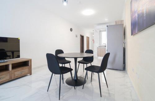 Tarxien Apartamento | Relaxed 2BR Home with Backyard & Balconies,Tarxien