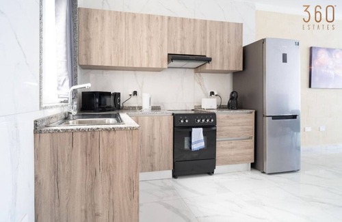 Tarxien Apartamento | Relaxed 2BR Home with Backyard & Balconies,Tarxien