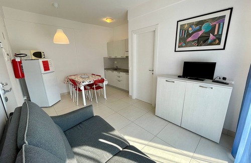 Porto Santa Margherita Apartamento | Vacaciones relajantes en la playa - piso con jardín