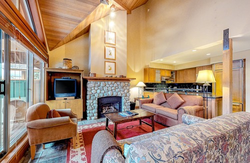 Village North Casa | Relaxing first-floor townhouse with a private hot tub, fireplace, & great views
