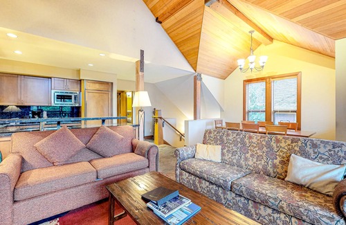 Village North Casa | Relaxing first-floor townhouse with a private hot tub, fireplace, & great views