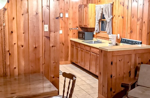 Presque Isle Cabina | Relaxing lake getaway with water views, on-site swimming, fishing, & boating