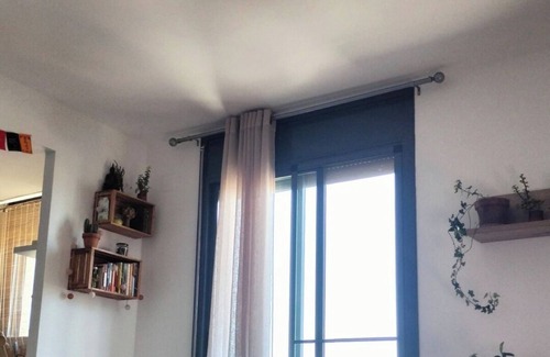 Sant Carles de la Rapita Apartamento | Relaxing stay with panoramic Delta and harbour views.