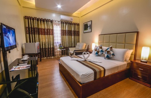 Puerto Princesa City Centre Hotel | Rema Tourist Inn