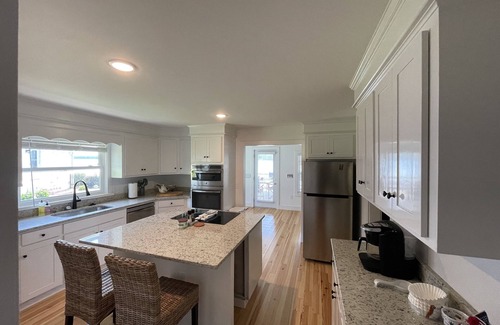 Chapin Casa | Remodeled home on Lake Murray. Large screen porch overlooks large yard, and dock