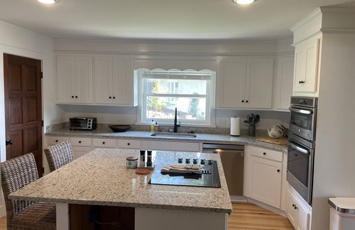 Chapin Casa | Remodeled home on Lake Murray. Large screen porch overlooks large yard, and dock