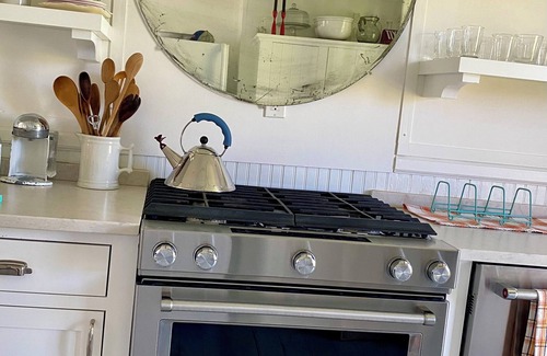 Town of Southold Town Cabaña | Renovated 1930's cottage on the water near Greenport with WiFi, AC