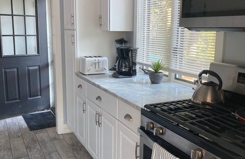 Mews Village Casa | Renovated Home with heated pool near the beach! Fenced in yard +pet friendly