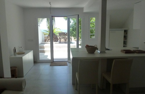 Sant Josep de sa Talaia Chalet De Esquí | casa frente al mar ha reformado moderno, con increíbles vistas al mar, acceso dir