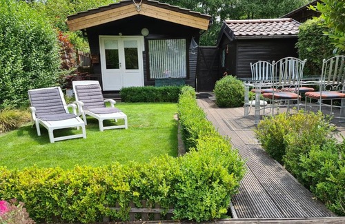 Geel Chalet De Esquí | Rent & Relax: De steiger