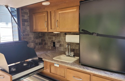 Bay Lake Casa | Rent thus wonderful HUGE camper with OUTDOOR KITCHEN!