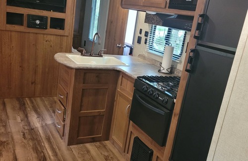 Bay Lake Casa | Rent thus wonderful HUGE camper with OUTDOOR KITCHEN!