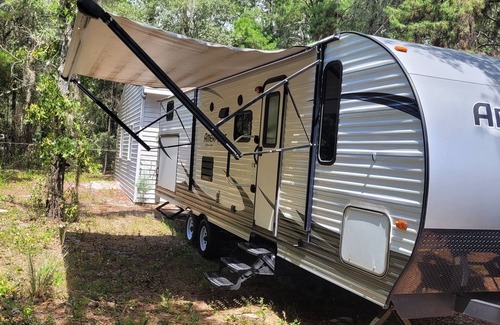 Bay Lake Casa | Rent thus wonderful HUGE camper with OUTDOOR KITCHEN!