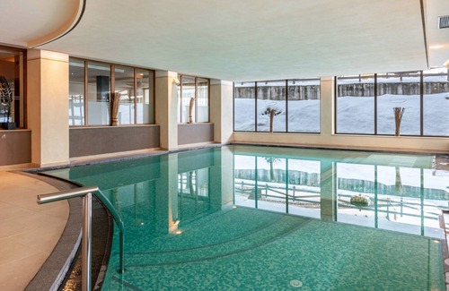 San Giovanni di Fassa Apartamento | "Residence Anda Appartamento 51" with Views of the Dolomite Peaks, Shared Indoor Pool & Jacuzzi