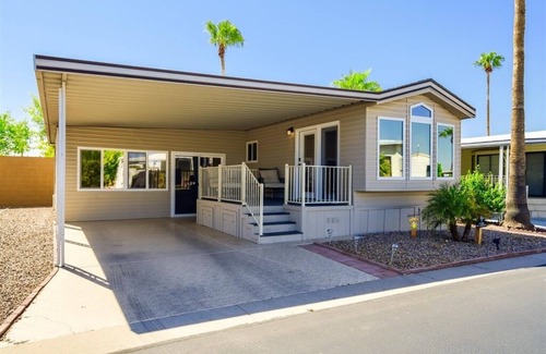 Carriage Manor Casa | Resort Living in this fully remodeled park home in Carriage Manor