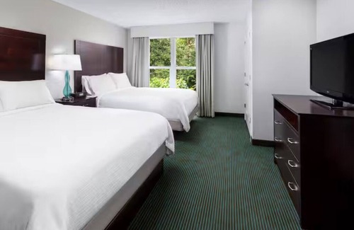 Florida Central Atlantic Coast Hotel | Resort-Style Stay | 4 Rooms, Game Zones, Pools, Shuttle, Near Parks