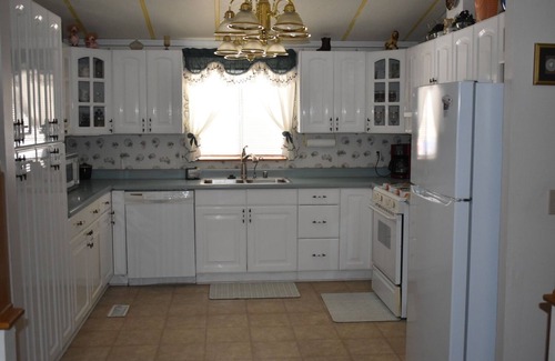 Holiday Shores Casa | Retro Charm Meets Home Comfort- 2BR/2BA Rivered Desert Retreat with Boat Parking