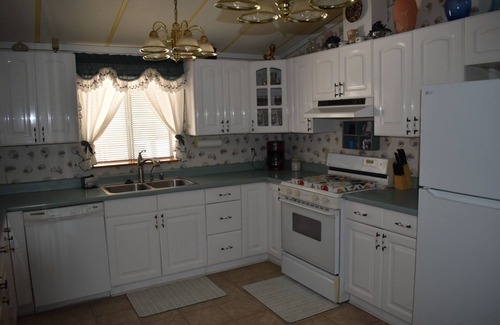 Holiday Shores Casa | Retro Charm Meets Home Comfort- 2BR/2BA Rivered Desert Retreat with Boat Parking