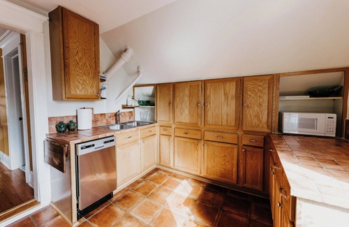 West Seventh Casa | Retro Jewel Box Victorian Steps from Irvine Park