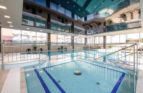 Rewal Apartamento | Rewal Cozy Apartment with Parking, Gym, Spa & Pool close to the Beach by Noclegi Renters