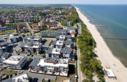Rewal Apartamento | Rewal Cozy Apartment with Parking, Gym, Spa & Pool close to the Beach by Noclegi Renters